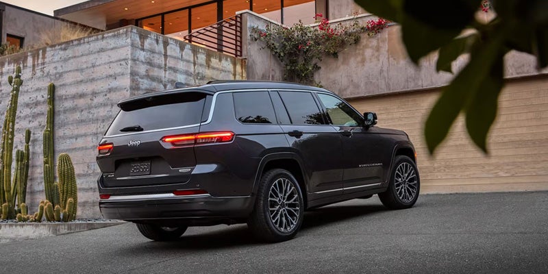 2026 Jeep Grand Cherokee approaching garage